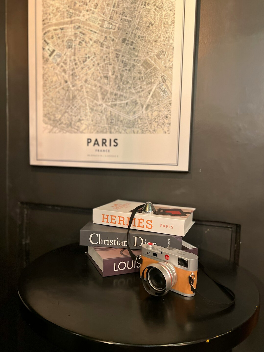 Desk with camera, notebook and map of Poland